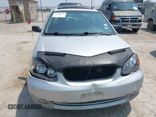 2006 Toyota Corolla CE z VIN 2T1BR32E96C677488, wystawiony jako IAAI lot #42286785 z przebiegiem 193 214 mil mil oraz . Historia ofert i sprzedaży dostępna na DreamBid. Obrazek 6.