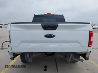 2018 Ford F-150 XL with VIN 1FTMF1CB4JKF54148, listed as a IAAI auction lot 42275439 with 157,811 mi miles and . Bid and sale history available at DreamBid. Image 17.