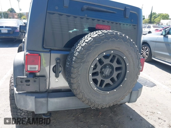 2016 Jeep Wrangler Unlimited Sport z VIN 1C4BJWDG7GL229364, wystawiony jako IAAI lot #42239069 z przebiegiem 87 001 mil mil oraz . Historia ofert i sprzedaży dostępna na DreamBid. Obrazek 16.