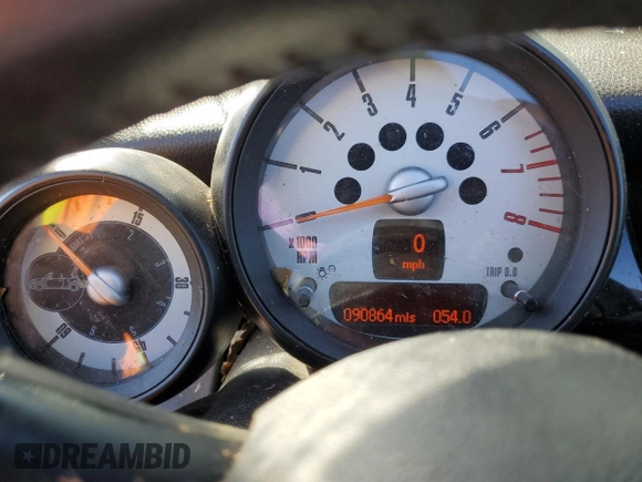 2012 MINI Convertible S with VIN WMWZP3C54CT296796, listed as a Copart auction lot 72209604 with 90,864 mi miles and Salvage title. Bid and sale history available at DreamBid. Image 9.