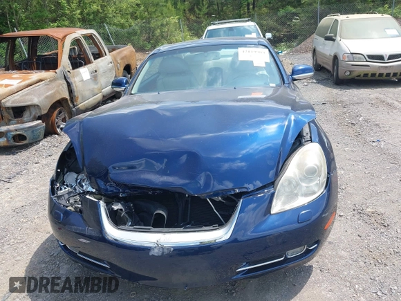 2006 Lexus SC 430 z VIN JTHFN48Y669006546, wystawiony jako IAAI lot #42119904 z przebiegiem 93 250 mil mil oraz . Historia ofert i sprzedaży dostępna na DreamBid. Obrazek 12.