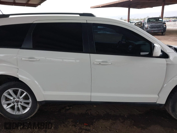 2017 Dodge Journey SXT z VIN 3C4PDDBG2HT595307, wystawiony jako IAAI lot #41813975 z przebiegiem 192 659 mil mil oraz . Historia ofert i sprzedaży dostępna na DreamBid. Obrazek 12.