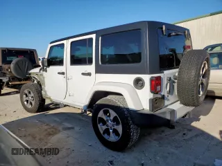 2016 Jeep Wrangler Unlimited Sahara z VIN 1C4HJWEG6GL218719, wystawiony jako Copart lot #56065235 z przebiegiem 96 061 mil mil oraz Szkoda całkowita • Salvage title. Historia ofert i sprzedaży dostępna na DreamBid. Obrazek 2.