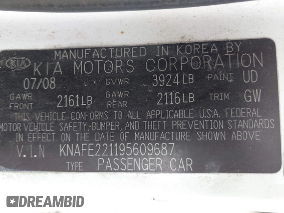 2009 Kia Spectra EX with VIN KNAFE221195609687, listed as a IAAI auction lot 42138825 with 105,170 mi miles. Bid and sale history available at carsss.com. Image 9.