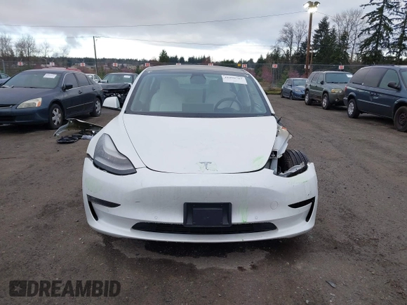 2021 Tesla Model 3 Long Range with VIN 5YJ3E1EB3MF856009, listed as a IAAI auction lot 41809767 with 42,072 mi miles. Bid and sale history available at carsss.com. Image 13.