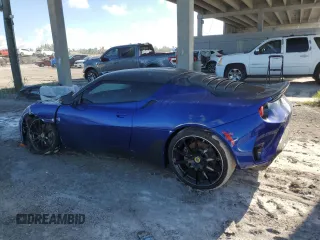 2021 Lotus Evora GT z VIN SCCLMDDN0MHA10373, wystawiony jako Copart lot #73548304 z przebiegiem 3936 mil mil oraz Szkody całkowita. Historia ofert i sprzedaży dostępna na DreamBid. Obrazek 2.