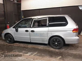 2002 Honda Odyssey LX z VIN 2HKRL18532H573727, wystawiony jako IAAI lot #42266783 z przebiegiem 127 491 mil mil oraz . Historia ofert i sprzedaży dostępna na DreamBid. Obrazek 15.