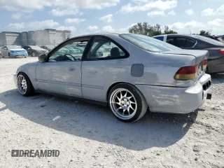 1997 Honda Civic EX z VIN 1HGEJ8143VL043998, wystawiony jako Copart lot #51795345 z przebiegiem 129 631 mil mil oraz Nie do naprawy • Non repairable. Historia ofert i sprzedaży dostępna na DreamBid. Obrazek 2.