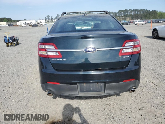 2014 Ford Taurus SEL with VIN 1FAHP2E87EG151866, listed as a Copart auction lot 52692965 with 201,680 mi miles and Clean Title. Bid and sale history available at DreamBid. Image 6.