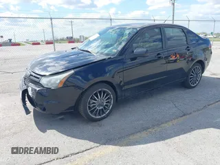 2010 Ford Focus SES with VIN 1FAHP3GN7AW291389, listed as a IAAI auction lot 42003153 with 151,987 mi miles. Bid and sale history available at carsss.com. Image 2.