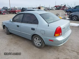 2005 Hyundai Accent GLS with VIN KMHCG45C65U576092, listed as a IAAI auction lot 41368504 with 162,208 mi miles. Bid and sale history available at carsss.com. Image 3.