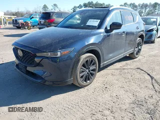2022 Mazda CX-5 2.5 Turbo with VIN JM3KFBAY4N0534690, listed as a IAAI auction lot 41716988 with 23,910 mi miles and . Bid and sale history available at carsss.com. Image 17.