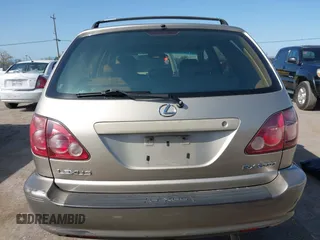 1999 Lexus RX 300 with VIN JT6HF10U6X0092078, listed as a IAAI auction lot 41988259 with 144,148 mi miles and . Bid and sale history available at DreamBid. Image 16.