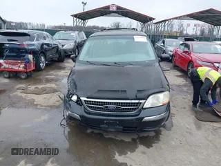 1999 Ford Windstar SE with VIN 2FMDA5243XBC41132, listed as a IAAI auction lot 41575559 with 240,497 mi miles and . Bid and sale history available at carsss.com. Image 12.