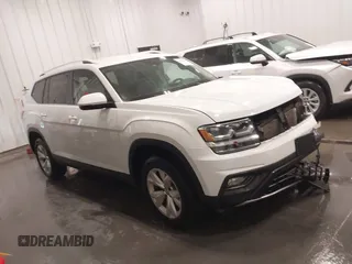 2018 Volkswagen Atlas SE z VIN 1V2KR2CA7JC574270, wystawiony jako IAAI lot #41654110 z przebiegiem 104 440 mil mil oraz . Historia ofert i sprzedaży dostępna na DreamBid. Obrazek 1.