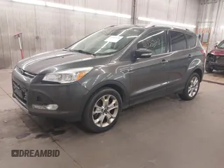 2015 Ford Escape Titanium with VIN 1FMCU9J96FUA43337, listed as a IAAI auction lot 41825328 with 149,639 mi miles and . Bid and sale history available at DreamBid. Image 18.