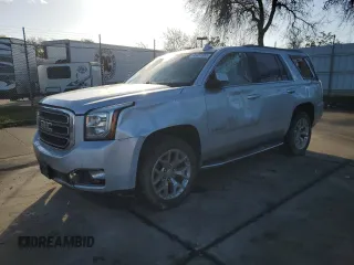 2017 GMC Yukon SLT with VIN 1GKS1BKCXHR162173, listed as a Copart auction lot 45451555 with 114,901 mi miles and Salvage Title. Bid and sale history available at carsss.com. Image 1.