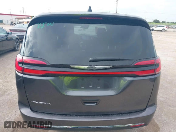 2023 Chrysler Pacifica Touring L with VIN 2C4RC1BG8PR594481, listed as a IAAI auction lot 42618839 with 60,748 mi miles and . Bid and sale history available at DreamBid. Image 16.