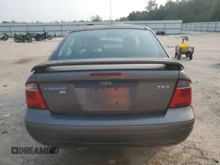2006 Ford Focus S с VIN 1FAHP34N06W115926, выставлен на аукционе Copart как лот 59145555 с пробегом 263 717 миль миль и Списание • Salvage title. История ставок и продаж доступна на DreamBid. Изображение 6.