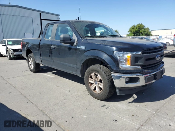 2018 Ford F-150 XL with VIN 1FTEX1EB2JKF61257, listed as a Copart auction lot 53674615 with 161,021 mi miles and Salvage title. Bid and sale history available at DreamBid. Image 4.