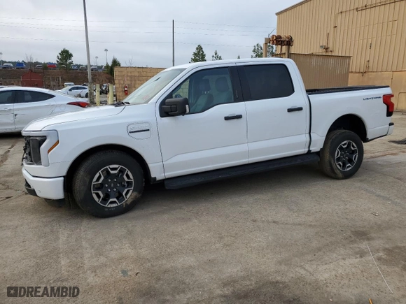 2023 Ford F-150 Lightning Pro with VIN 1FTVW1ELXPWG63466, listed as a Copart auction lot 43397005 with 8,852 mi miles and Salvage Title. Bid and sale history available at carsss.com. Image 1.