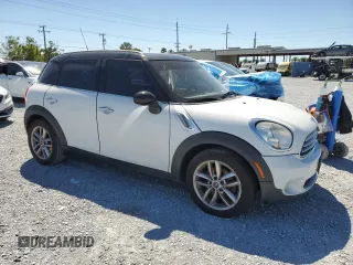 2011 MINI Countryman with VIN WMWZB3C55BWM00224, listed as a Copart auction lot 51319055 with 182,840 mi miles and Non Repairable. Bid and sale history available at DreamBid. Image 4.