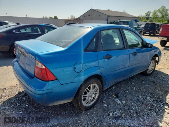 2007 Ford Focus S z VIN 1FAFP34N87W107744, wystawiony jako Copart lot #61934615 z przebiegiem Nie podano mil oraz Szkoda całkowita • Salvage title. Historia ofert i sprzedaży dostępna na DreamBid. Obrazek 3.