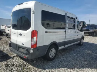 2015 Ford Transit Passenger XL with VIN 1FBAX2CM1FKB00328, listed as a Copart auction lot 43079865 with 55,851 mi miles and Salvage Title. Bid and sale history available at carsss.com. Image 3.