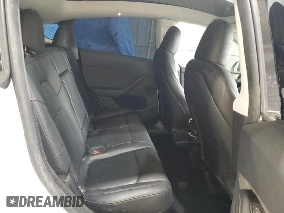 2024 Tesla Model Y Long Range с VIN 7SAYGDEE8RA266519, выставлен на аукционе Copart как лот 60899095 с пробегом Не указан миль и Списание • Salvage title. История ставок и продаж доступна на DreamBid. Изображение 10.