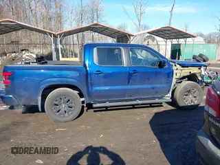 2022 Nissan Frontier SV z VIN 1N6ED1EJ6NN641551, wystawiony jako IAAI lot #41395093 z przebiegiem 61 796 mil mil oraz . Historia ofert i sprzedaży dostępna na DreamBid. Obrazek 13.