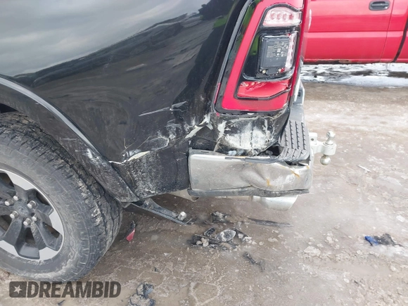 2019 Ram 1500 Laramie with VIN 1C6SRFDT6KN869740, listed as a IAAI auction lot 41563751 with 132,611 mi miles. Bid and sale history available at carsss.com. Image 6.