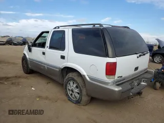 2001 GMC Jimmy SLT with VIN 1GKDT13W412121445, listed as a Copart auction lot 76842164 with 277,068 mi miles and Salvage Title. Bid and sale history available at carsss.com. Image 2.