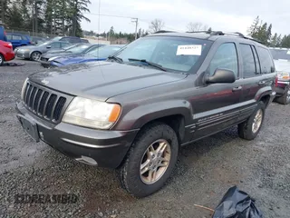 1999 Jeep Grand Cherokee Limited with VIN 1J4GW68N7XC739479, listed as a IAAI auction lot 41448323 with 129,840 mi miles. Bid and sale history available at carsss.com. Image 2.