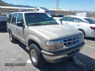 1996 Ford Explorer XLT z VIN 1FMDU32P2TZB12747, wystawiony jako IAAI lot #41879819 z przebiegiem 215 439 mil mil oraz . Historia ofert i sprzedaży dostępna na DreamBid. Obrazek 1.