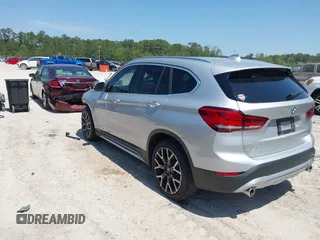 2021 BMW X1 sDrive28i with VIN WBXJG7C06M5T14235, listed as a IAAI auction lot 42021762 with 53,384 mi miles and . Bid and sale history available at DreamBid. Image 3.