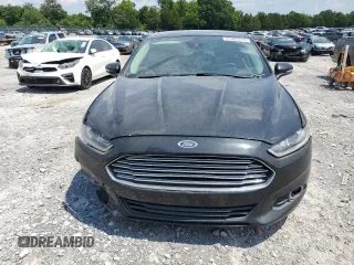 2013 Ford Fusion SE Hybrid with VIN 3FA6P0LU7DR288731, listed as a Copart auction lot 63902215 with 124,176 mi miles and Salvage title. Bid and sale history available at DreamBid. Image 5.