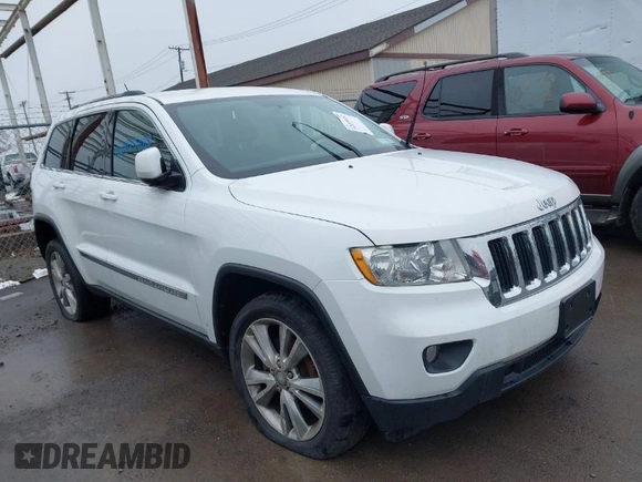 2013 Jeep Grand Cherokee Laredo with VIN 1C4RJFAG6DC557163, listed as a IAAI auction lot 42019052 with 125,058 mi miles. Bid and sale history available at carsss.com. Image 1.