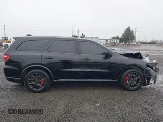 2021 Dodge Durango SRT Hellcat with VIN 1C4SDJH95MC643177, listed as a IAAI auction lot 41007139 with 31,650 mi miles and . Bid and sale history available at DreamBid. Image 14.