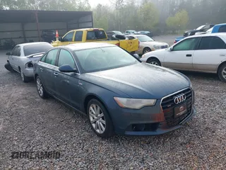 2014 Audi A6 Premium Plus z VIN WAUFGAFC1EN005003, wystawiony jako IAAI lot #41852397 z przebiegiem Nie podano mil oraz . Historia ofert i sprzedaży dostępna na DreamBid. Obrazek 1.