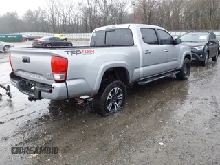 2017 Toyota Tacoma SR5 with VIN 5TFDZ5BN6HX025338, listed as a IAAI auction lot 41754879 with Not provided miles and . Bid and sale history available at DreamBid. Image 4.