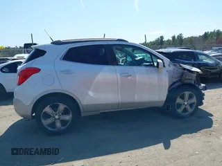 2014 Buick Encore Leather with VIN KL4CJCSB8EB740671, listed as a IAAI auction lot 42077603 with 112,561 mi miles and . Bid and sale history available at carsss.com. Image 14.