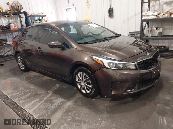 2017 Kia Forte LX with VIN 3KPFK4A71HE056667, listed as a IAAI auction lot 42030307 with 99,320 mi miles. Bid and sale history available at carsss.com. Image 1.