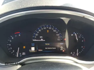 2013 Cadillac SRX Performance Collection with VIN 3GYFNHE37DS649235, listed as a Copart auction lot 56939285 with 104,692 mi miles and Salvage title. Bid and sale history available at DreamBid. Image 9.
