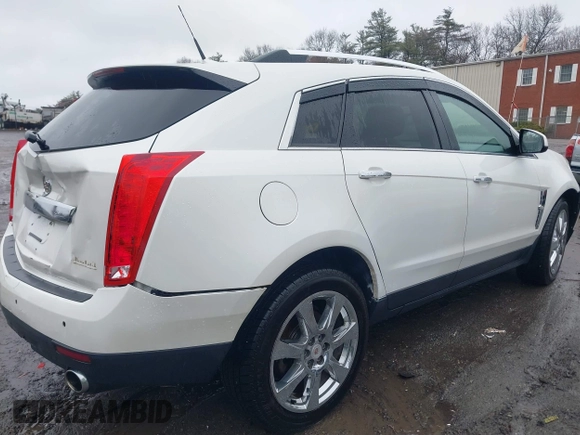2011 Cadillac SRX Premium Collection with VIN 3GYFNFEYXBS519673, listed as a IAAI auction lot 41911253 with 180,986 mi miles. Bid and sale history available at carsss.com. Image 4.