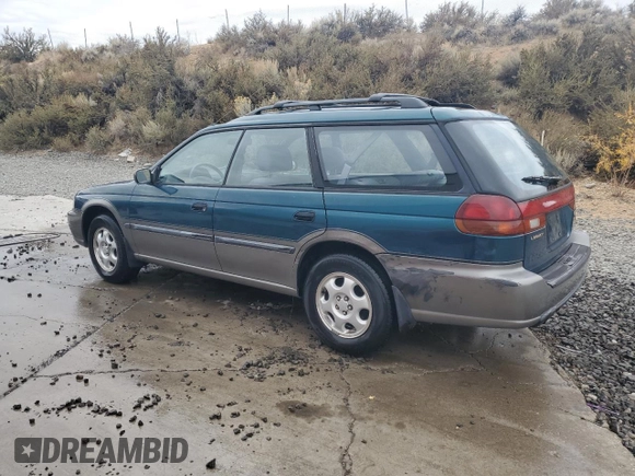 1996 Subaru Legacy Outback with VIN 4S3BG685XT7984194, listed as a Copart auction lot 77999224 with 130,804 mi miles and Salvage title. Bid and sale history available at DreamBid. Image 2.