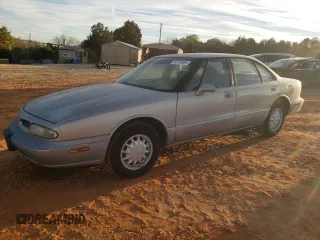 1998 Oldsmobile 88 LS z VIN 1G3HN52K7W4803373, wystawiony jako Copart lot #80753864 z przebiegiem Nie podano mil oraz Tytuł czysty. Historia ofert i sprzedaży dostępna na DreamBid. Obrazek 1.