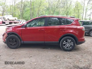 2016 Toyota RAV4 LE with VIN JTMZFREV4GJ062701, listed as a IAAI auction lot 42084694 with 121,553 mi miles and . Bid and sale history available at DreamBid. Image 15.