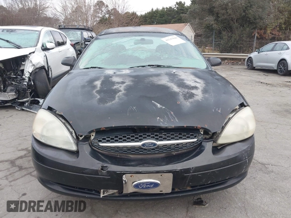 2000 Ford Taurus SE with VIN 1FAFP53U9YA252519, listed as a IAAI auction lot 41247046 with 317,910 mi miles and . Bid and sale history available at DreamBid. Image 11.