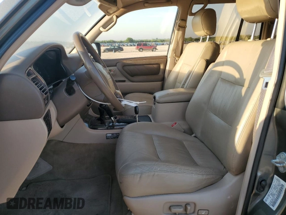 2000 Toyota Land Cruiser z VIN JT3HT05J9Y0123937, wystawiony jako Copart lot #56599145 z przebiegiem 132 262 mil mil oraz Szkoda całkowita • Salvage title. Historia ofert i sprzedaży dostępna na DreamBid. Obrazek 7.