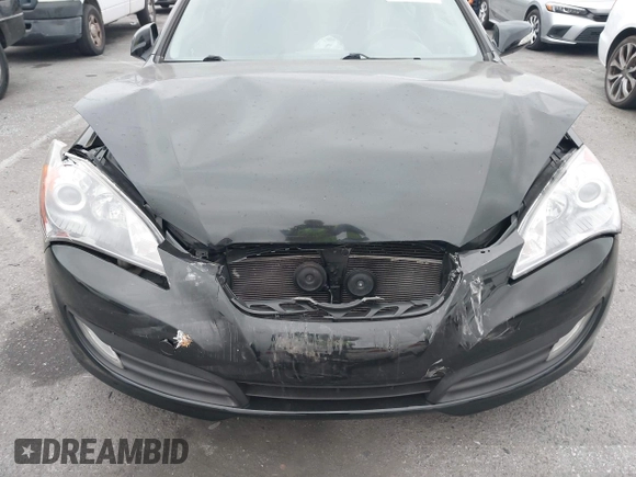 2012 Hyundai Genesis Coupe Grand Touring with VIN KMHHU6KH9CU071252, listed as a IAAI auction lot 42358871 with 92,528 mi miles and . Bid and sale history available at DreamBid. Image 6.